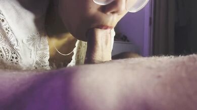 Asian schoolgirl deepthroat blowjob with cum in mouth close up.