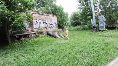 Street nude session with burned car exhibitionist Russian girl walks naked
