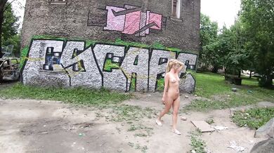 Street nude session with burned car exhibitionist Russian girl walks naked