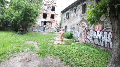 Street nude session with burned car exhibitionist Russian girl walks naked