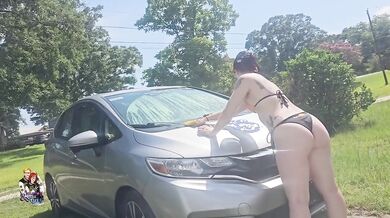 Little elfy gets her ass soaked while washing my car