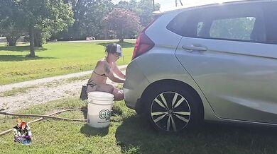 Little elfy gets her ass soaked while washing my car