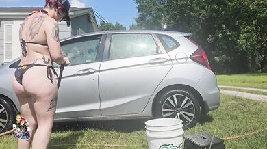 Little elfy gets her ass soaked while washing my car