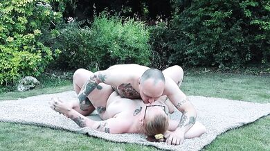 British Tattooed Redhead MILF fucked outdoors on her knees gagging on a BBC