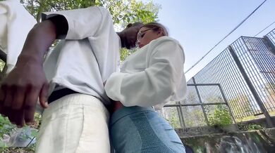 Italian girl gets down on knees in the park and gobbles big black cock raw and sloppy