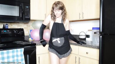 Bored housewife popped by balloon looner while wearing apron
