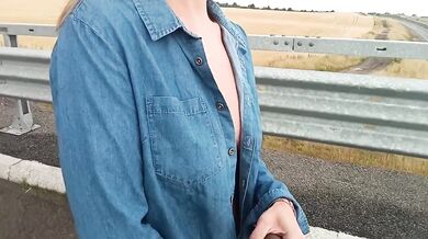 Naked woman flashes tits then pisses in the middle of the street