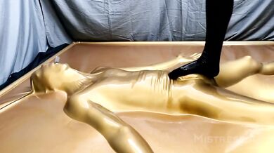 Latex Lovers Trapped in Gold Bondage
