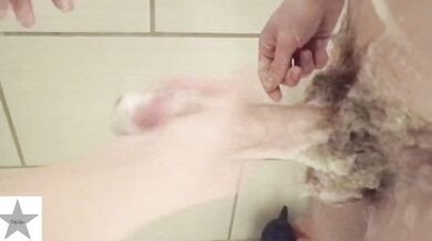 POV amateur girl gives soapy handjob in homemade video