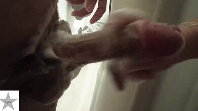 POV amateur girl gives soapy handjob in homemade video