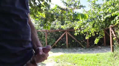 Redhead risks public cumshot tease in park