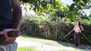 Redhead risks public cumshot tease in park