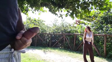Redhead risks public cumshot tease in park