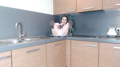 Schoolgirl solo in kitchen makes toys squirt lola rae british babe