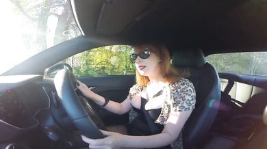 MILF masturbates in pantyhose while driving out in the countryside