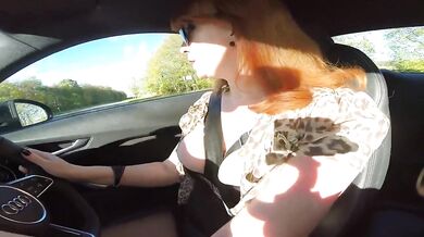MILF masturbates in pantyhose while driving out in the countryside