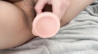 Asian girl slowly stretches her tight pussy with growing dildo until it's dripping messy