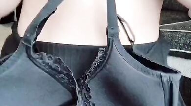 Teasing UK brunette masturbates with her huge natural tits
