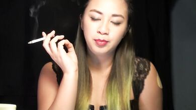 Asian smoker with nicotine patch and lipstick slut collared in fetish solo