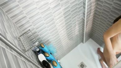 Hot blown wife shaving her pussy in a steamy shower