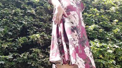 Under my sexy dress I wear a diaper waiting to be soaked in the park