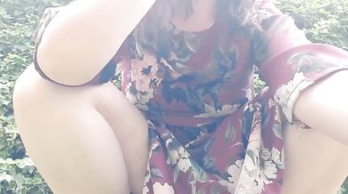 Under my sexy dress I wear a diaper waiting to be soaked in the park