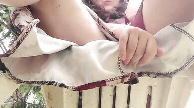 Under my sexy dress I wear a diaper waiting to be soaked in the park