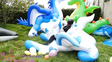 Miss Maskerade in latex catsuit pops balloons while solo looner bondage fantasy