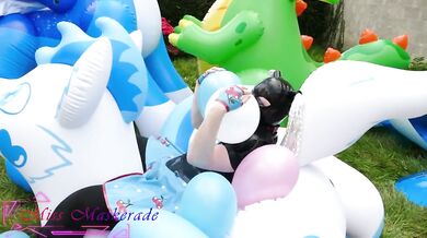 Miss Maskerade in latex catsuit pops balloons while solo looner bondage fantasy