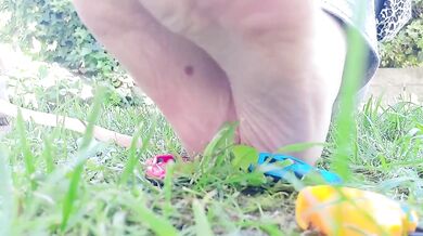 Giantess giant sweaty feet crushes toy cars into mash under her soles