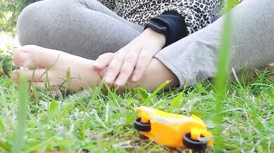 Giantess giant sweaty feet crushes toy cars into mash under her soles