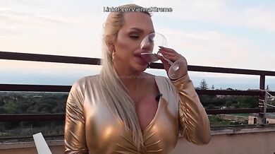 Bimbo with giant lips tries to drink without making a mess no glass works
