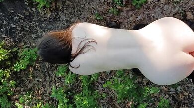 Young Russian Exhibitionist walks naked through forest park POV