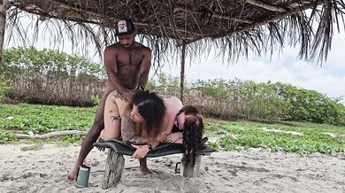 Milf rides two tight butts on beach drenching them with cum
