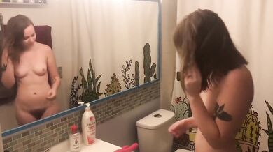 Horny girl stripped naked and fucked herself raw in the shower