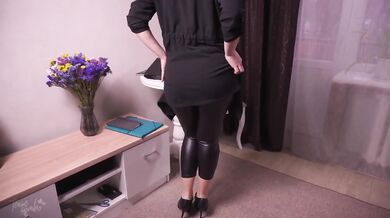 Secretary in leather pants teases boss with her tight ass