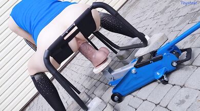 Gaping her tight pussy with monster dildo car jack forced open