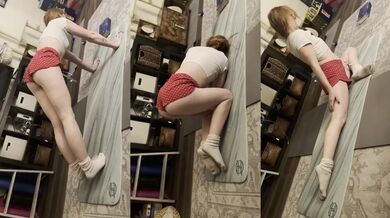 Ripped booty shorts squeezing tight while stretching in her dirty socks