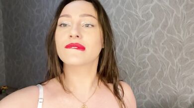 Brunette striptease with huge natural tits playing with her big nipples