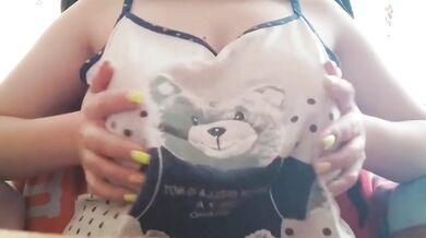Busty student moans as she fingerfucks her huge natural tits while studying