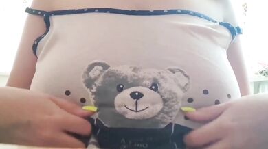 Busty student moans as she fingerfucks her huge natural tits while studying