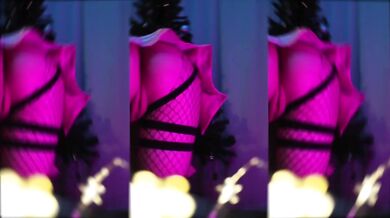 Schoolgirl decorating Christmas tree bare underneath tearing through fishnets