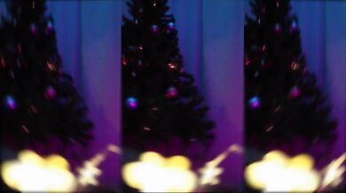 Schoolgirl decorating Christmas tree bare underneath tearing through fishnets