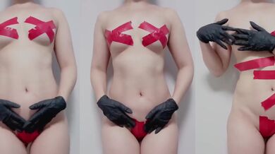 Amateur hides nipples with red tape and jerks off