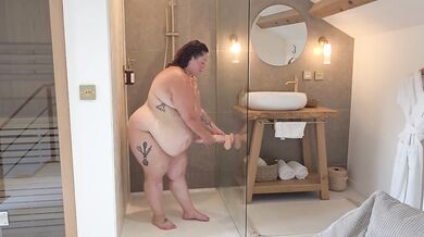 I masturbate in the shower with a giant dildo her big ass gushing orgasm