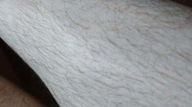 Hairy legs and black panties close up