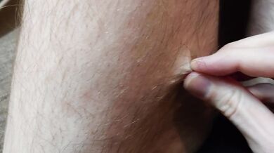 Hairy legs and black panties close up