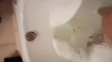 Soaked in stockings teasing her husband while solo in the tub