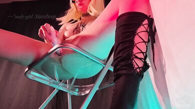 Blonde glasses girl squirts hard on a glass chair with toys