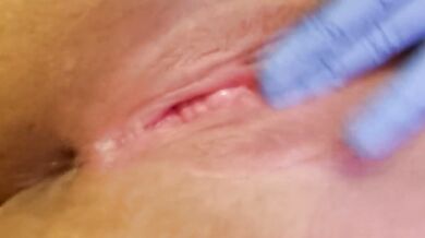 Nurse in medical gloves destroys her big ass and natural tits while fingering her pussy raw